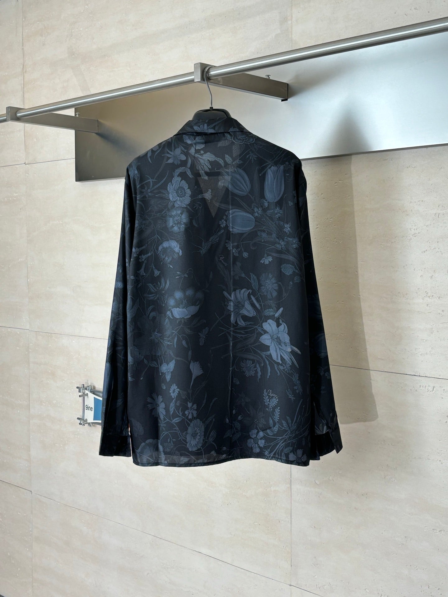 Gucci long-sleeve button-up shirt back view, dark navy floral pattern
