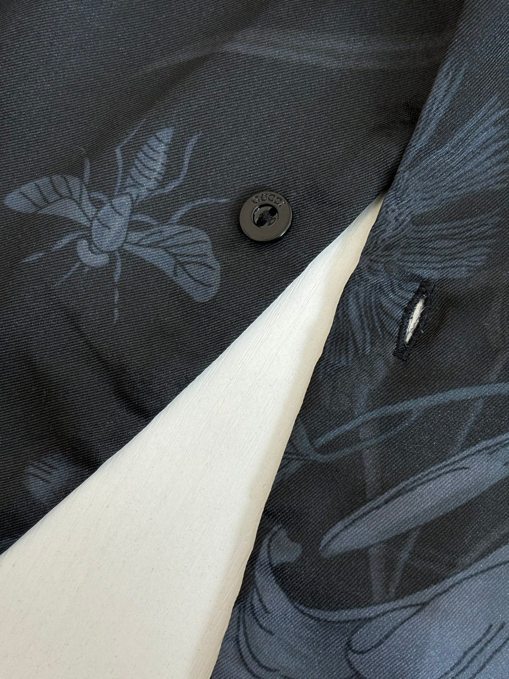 Gucci long-sleeve shirt button detail with dark navy floral fabric
