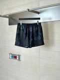 Gucci printed shorts, dark floral pattern, elastic waistband