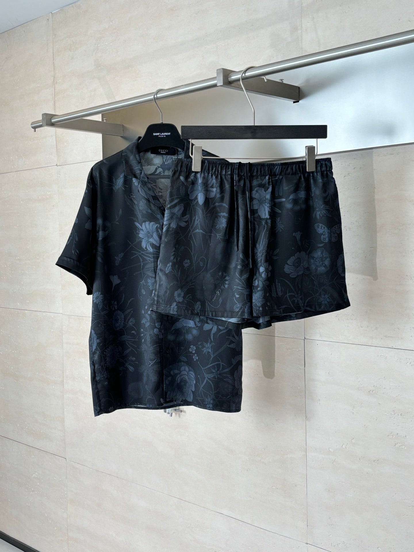 Gucci floral print shorts, dark patterned fabric, elastic waist