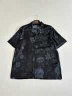 Gucci short-sleeve button-up shirt with collar, dark fabric and blue floral print