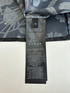 Gucci short with dark floral fabric and size tag, 46