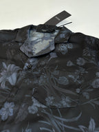 Gucci short-sleeve shirt detail, dark fabric with blue floral pattern