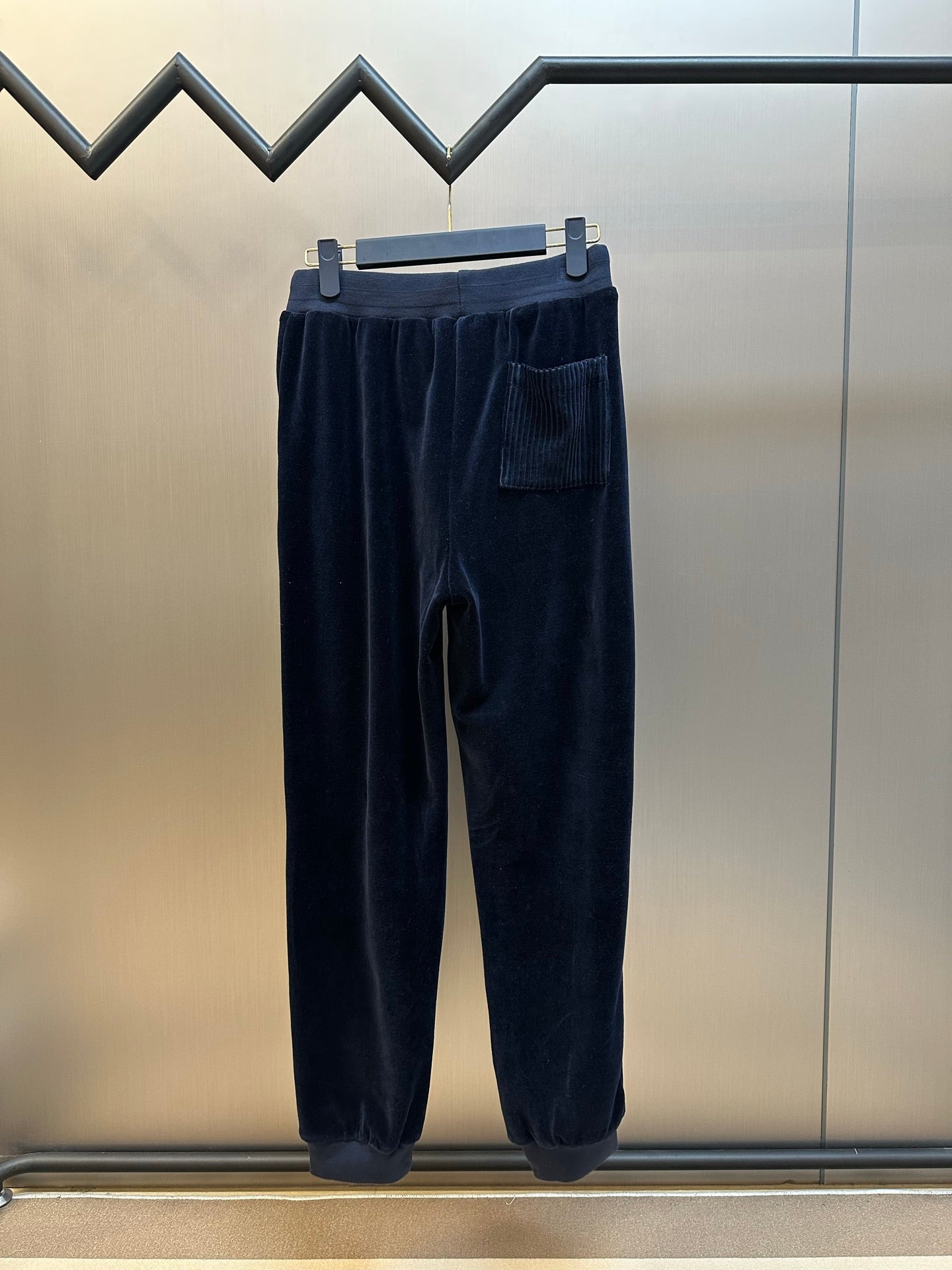 Louis Vuitton pants back view, dark navy with pocket and elastic cuffs