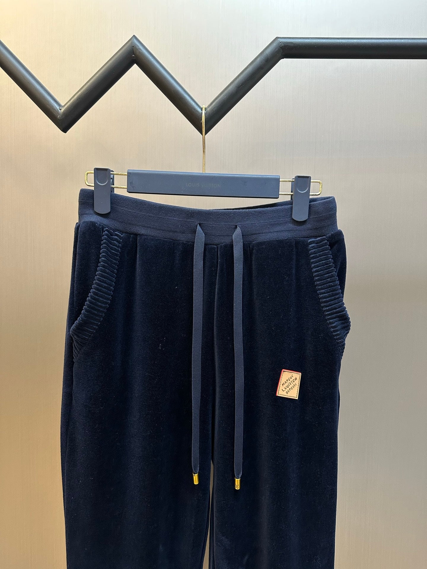 Louis Vuitton drawstring pants, dark navy with drawcords and ribbed waistband