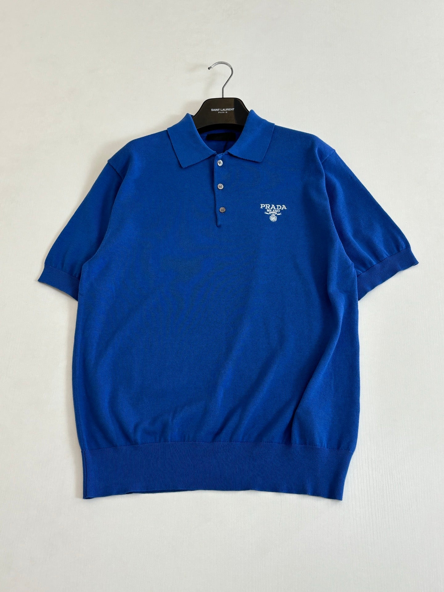 Blue polo shirt with button placket and Prada Milano chest logo