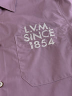 Louis Vuitton lilac shirt chest graphic reading LV M since 1854