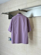 Louis Vuitton lilac short-sleeve button-up shirt, back view on hanger