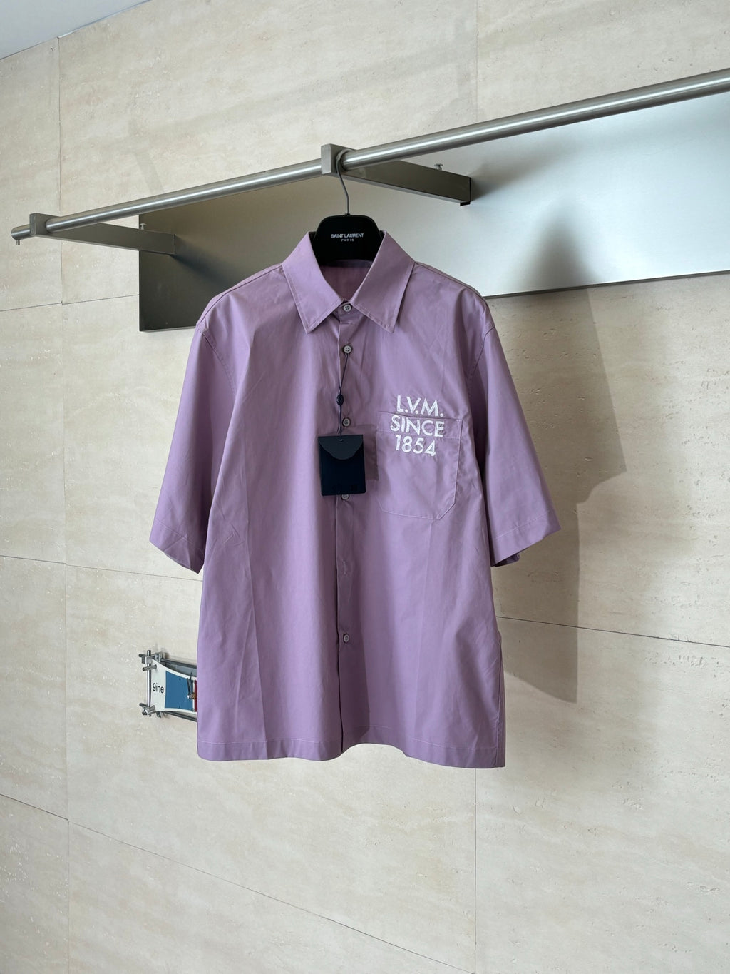 Louis Vuitton lilac short-sleeve button-up shirt with pointed collar and LV graphics