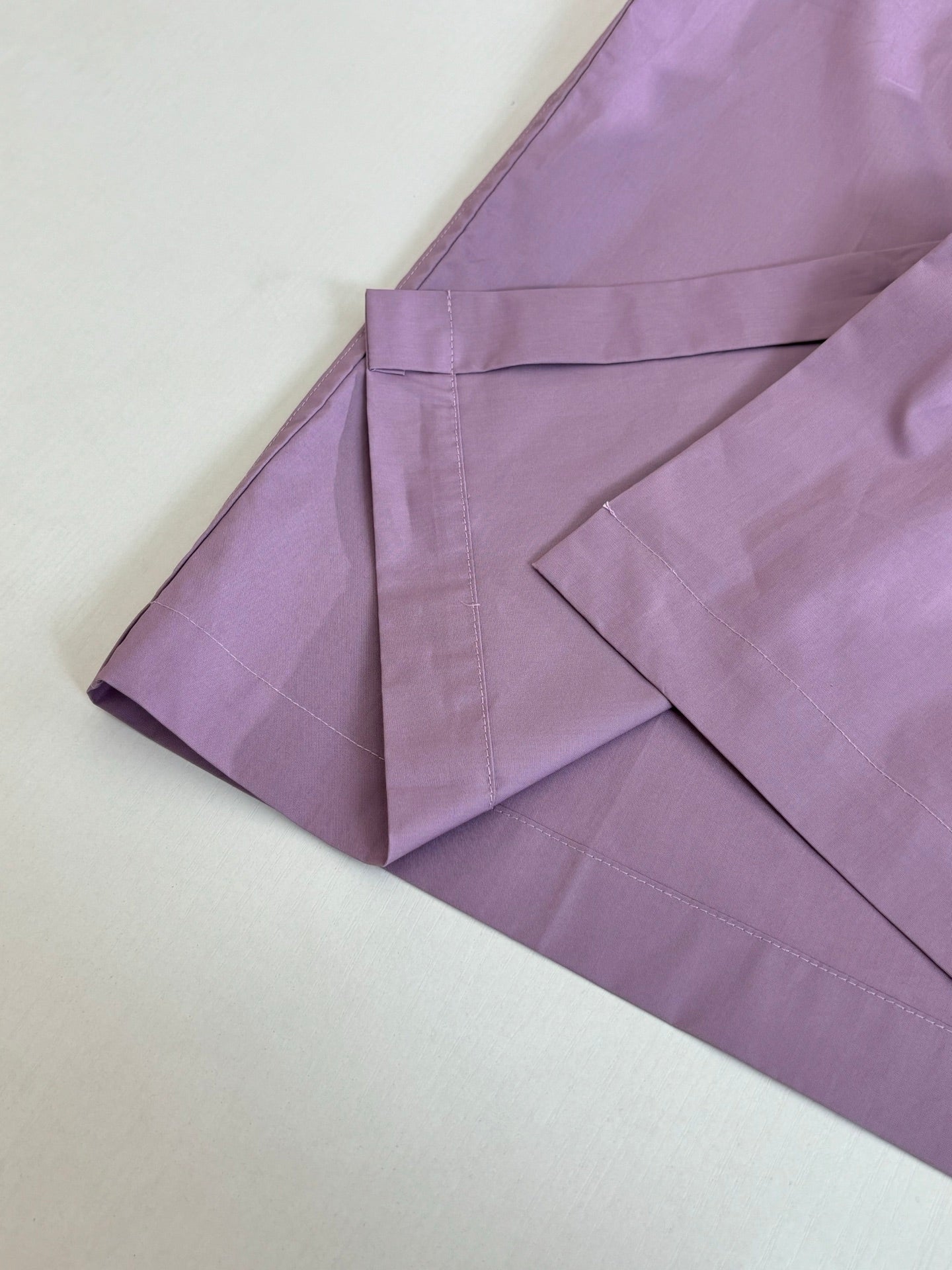 Louis Vuitton lilac shirt sleeves and side seam with folded hem detail