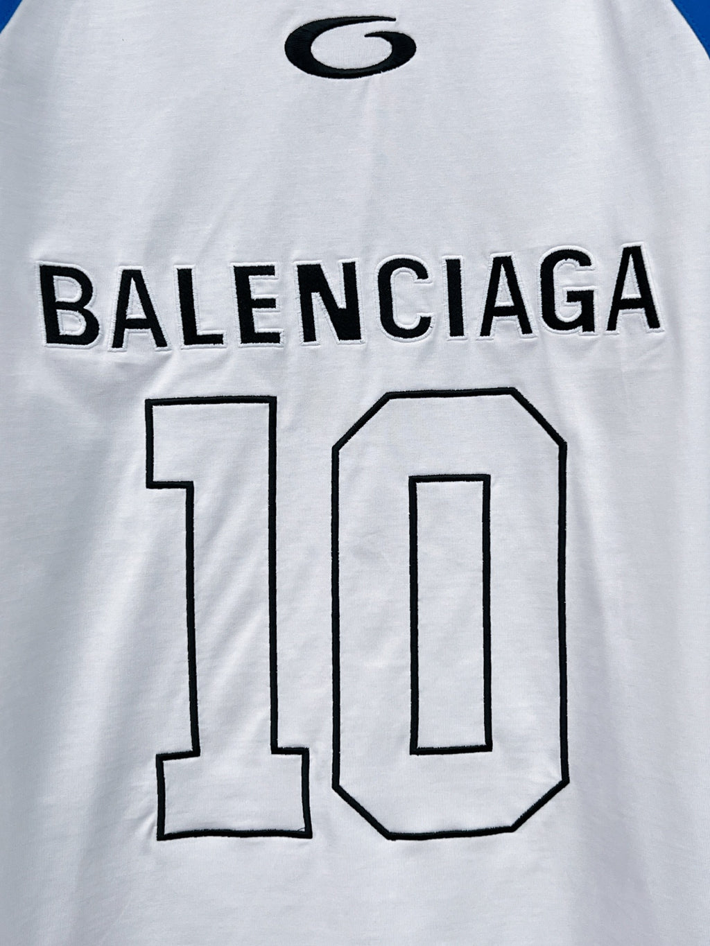 White long-sleeve T-shirt with BALENCIAGA text and large outlined number 10