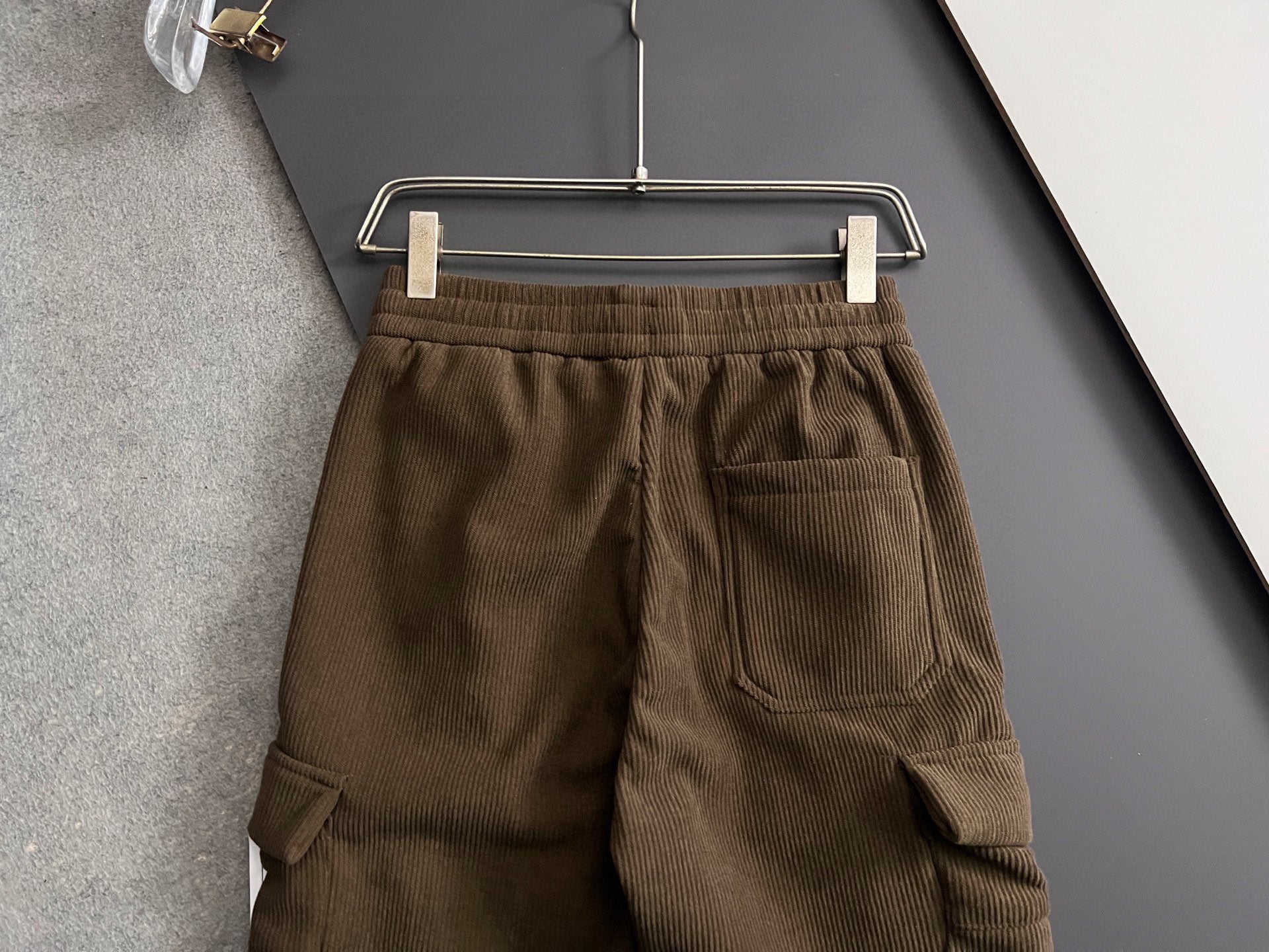 Brown cargo pants with elastic waistband and side cargo pockets