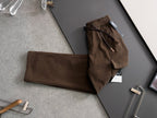 Brown cargo pants with elastic waistband and drawstring, laid flat