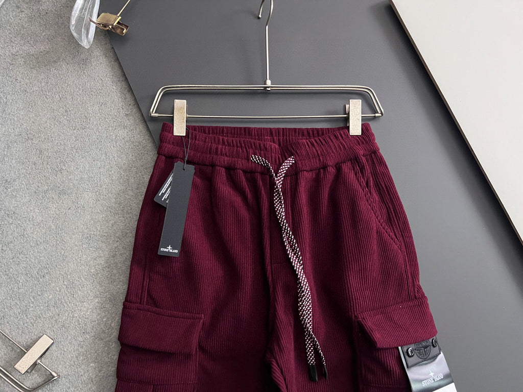 Burgundy cargo pants with drawstring and cargo pockets, elastic waistband