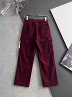 Burgundy cargo pants with drawstring and multiple cargo pockets