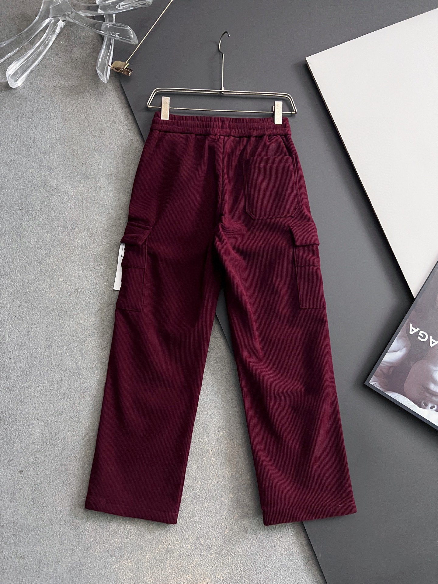 Burgundy cargo pants with drawstring and multiple cargo pockets