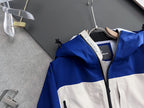 Moncler long hooded jacket front, blue with white stripe and zip closure