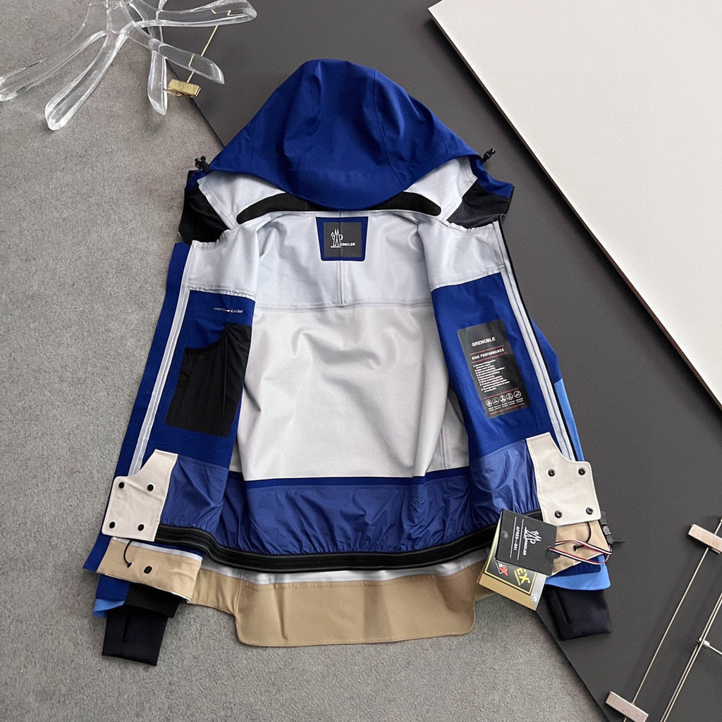 Moncler long hooded jacket interior view, white lining with blue outer panels