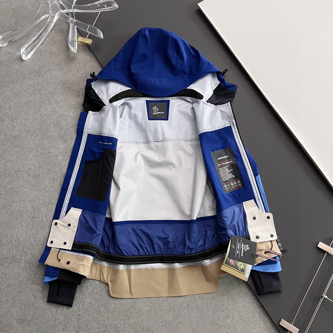 Moncler long hooded jacket interior view, white lining with blue outer panels