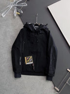 Moncler long hooded jacket, black with zip front and logo tag
