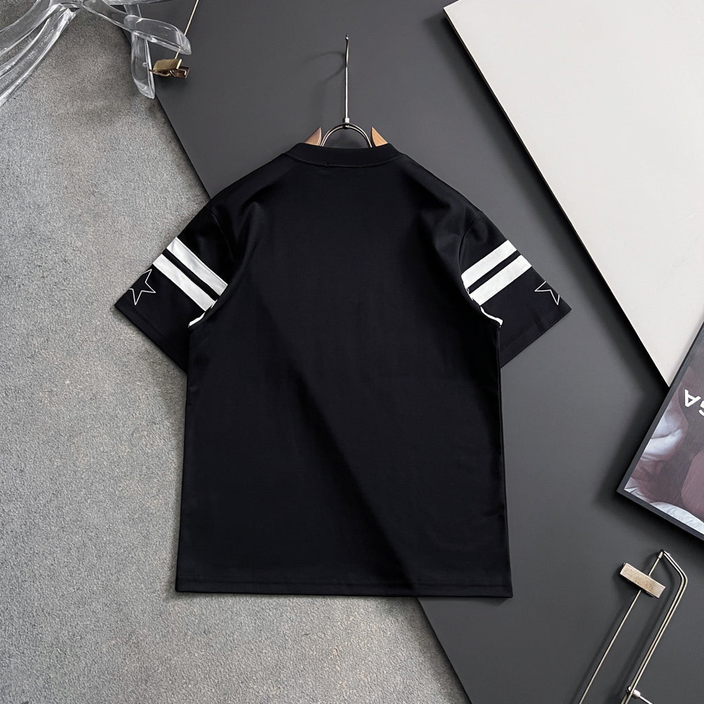 Black T-shirt with striped sleeve cuffs, shown from the back on a hanger