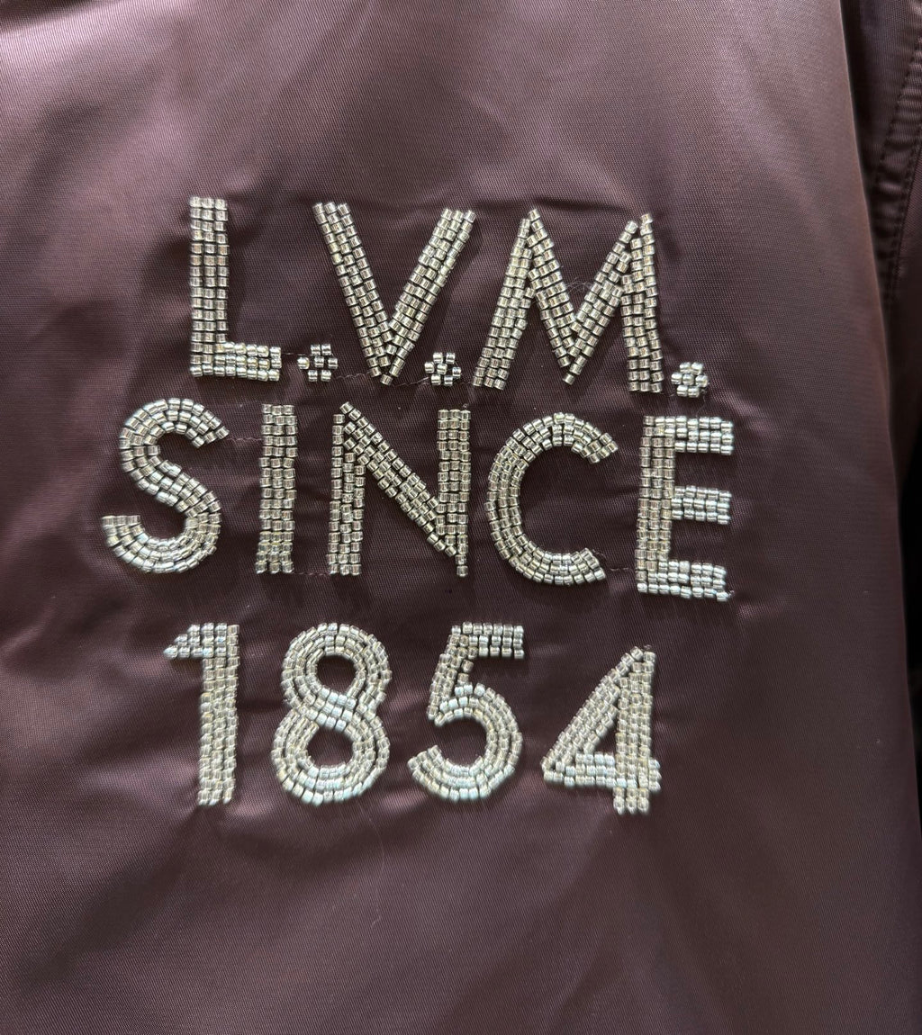 Burgundy bomber jacket logo text LV Since 1854 with rhinestone embellishment