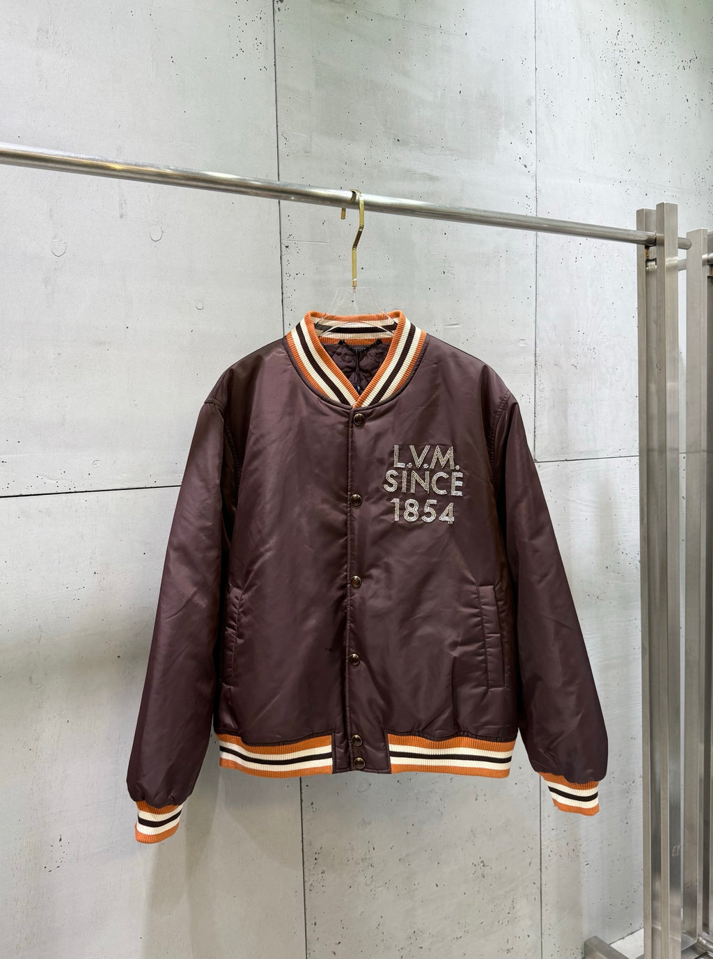 Burgundy satin bomber jacket with striped ribbed collar, snap buttons, LV Since 1854