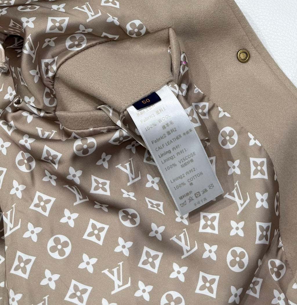 Louis Vuitton jacket inside lining with beige base and white monogram floral pattern.