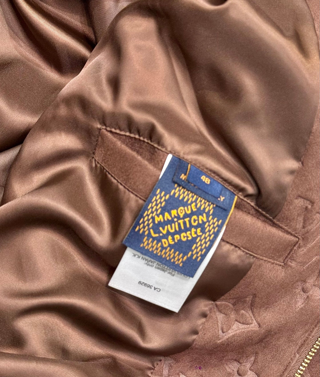 Louis Vuitton size care label on satin lining, mauve-brown jacket