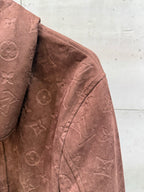 Louis Vuitton monogram jacket fabric panel, mauve-brown texture
