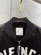 Black bomber jacket neckline with ribbed collar and front zipper