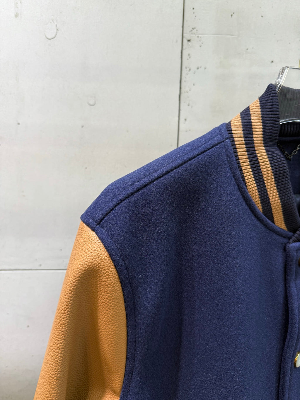 Louis Vuitton varsity jacket shoulder and sleeve with striped ribbed trim