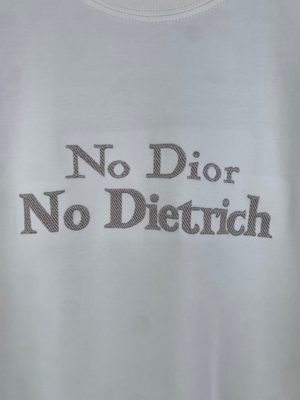 White T-shirt front with large 'No Dior No Dietrich' lettering print