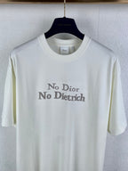 White short-sleeve T-shirt with 'No Dior No Dietrich' front graphic