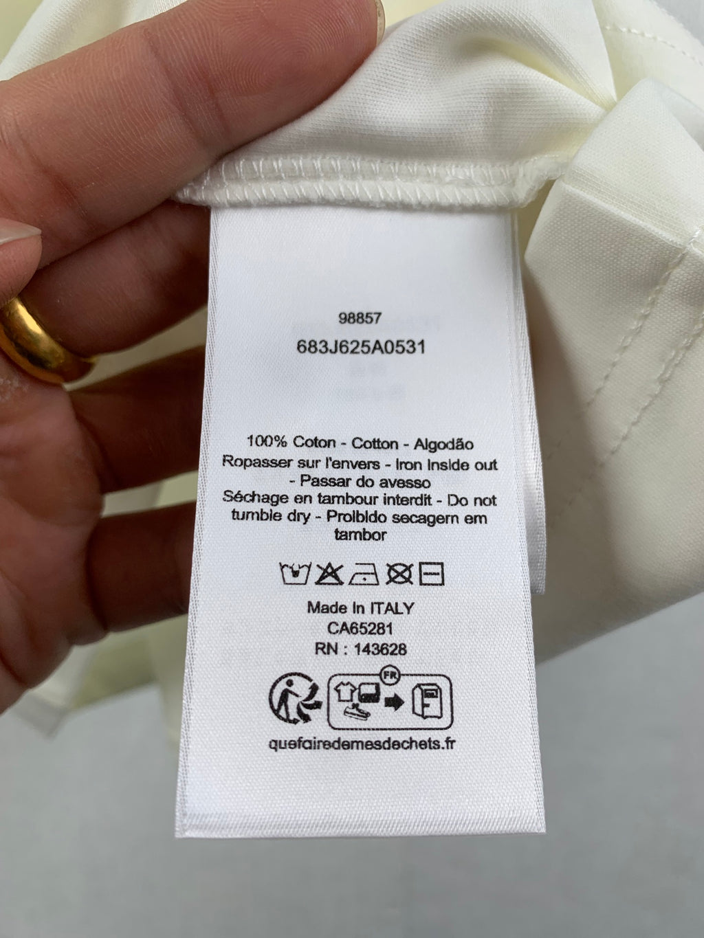 White T-shirt care label and size info, Made in Italy