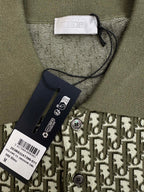 Olive short-sleeve polo collar with size and care tags