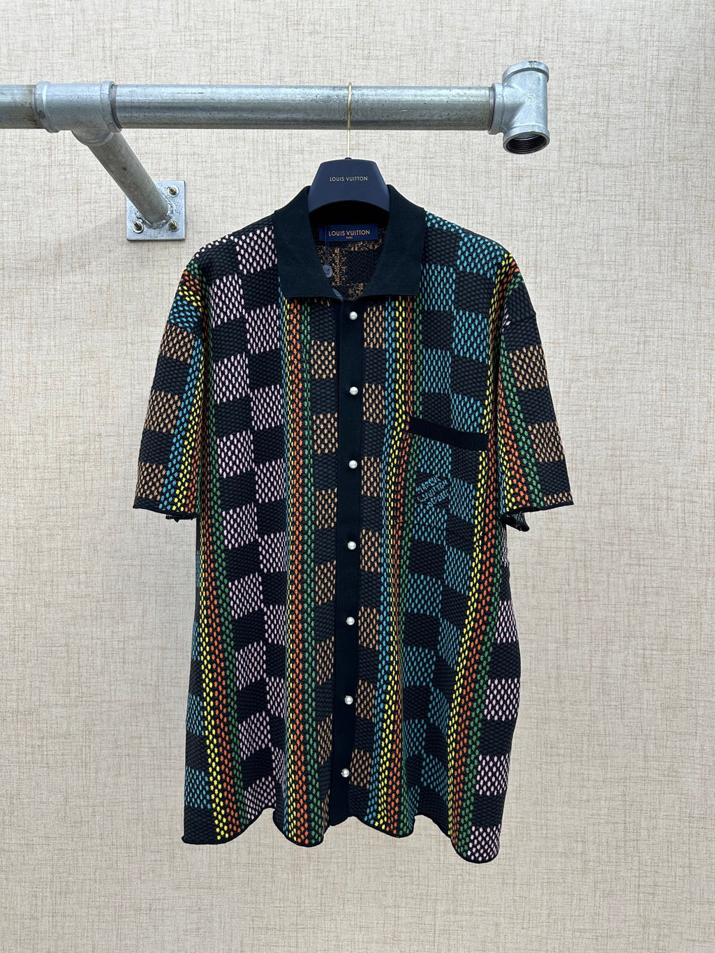 Dark multicolor checkered short-sleeve button-up shirt with spread collar