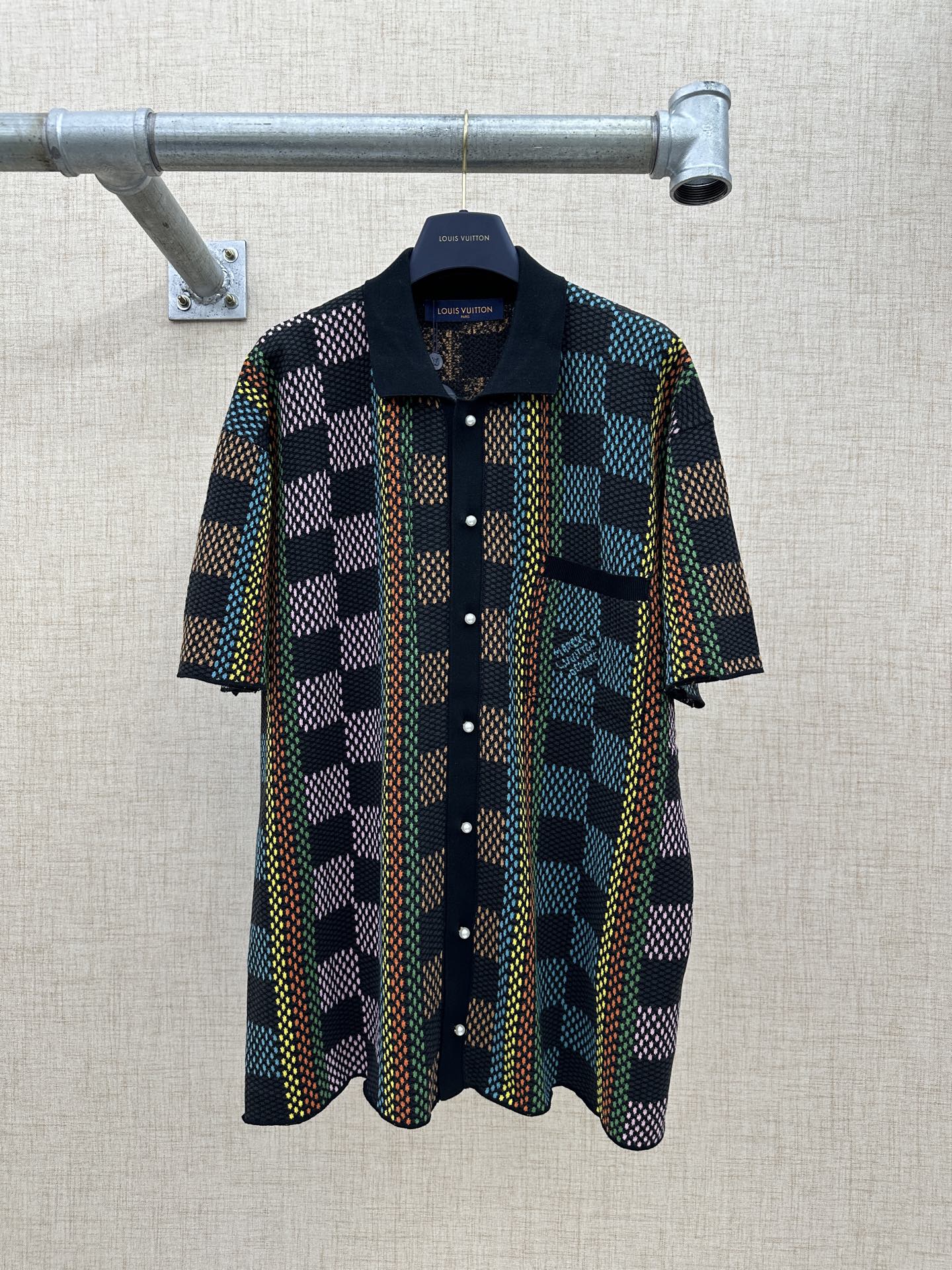 Dark multicolor checkered short-sleeve button-up shirt with spread collar
