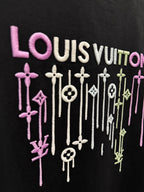 Black T-shirt close-up of LOUIS VUITTON multicolor drip graphic