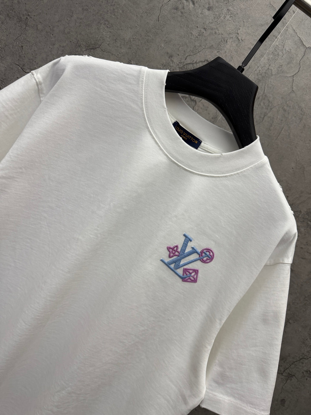 White T-shirt neckline with embroidered Louis Vuitton emblem