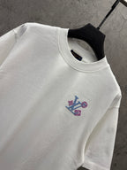 White T-shirt neckline with embroidered Louis Vuitton emblem