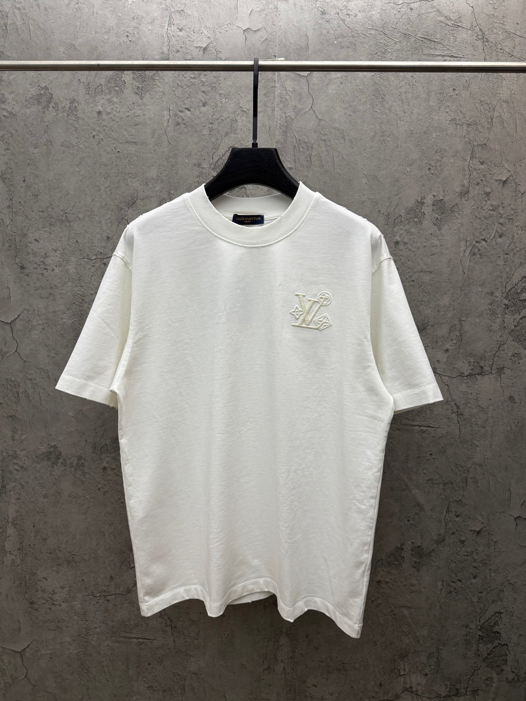 White short-sleeve T-shirt with small Louis Vuitton chest logo