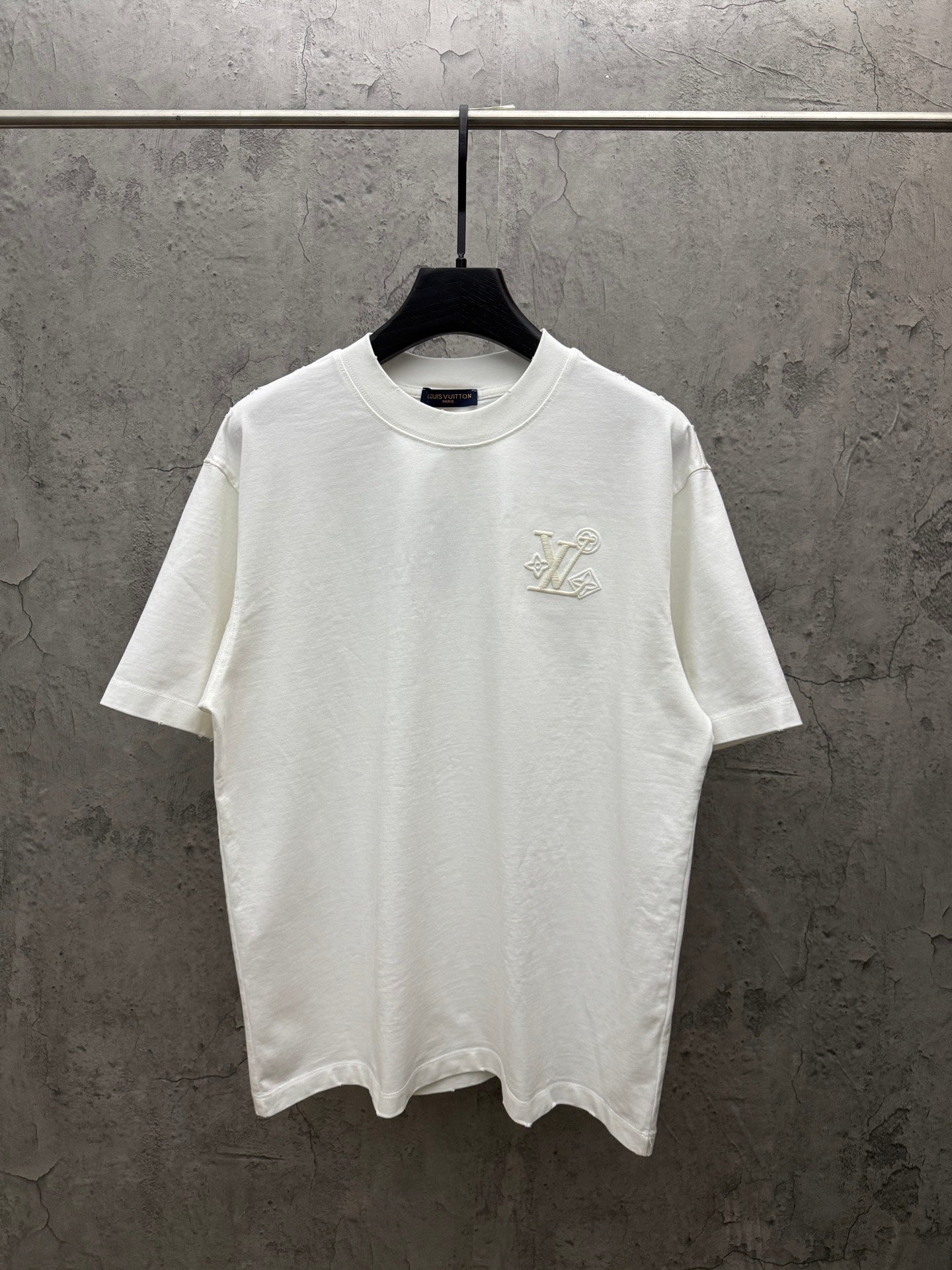 White short-sleeve T-shirt with small Louis Vuitton chest logo