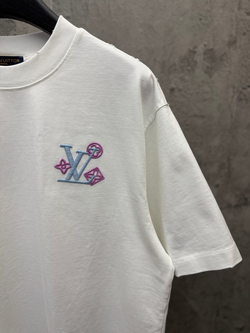 White short-sleeve T-shirt with multicolor Louis Vuitton chest logo