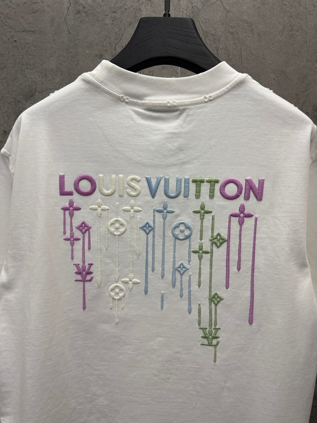 White short-sleeve T-shirt with large Louis Vuitton back graphic