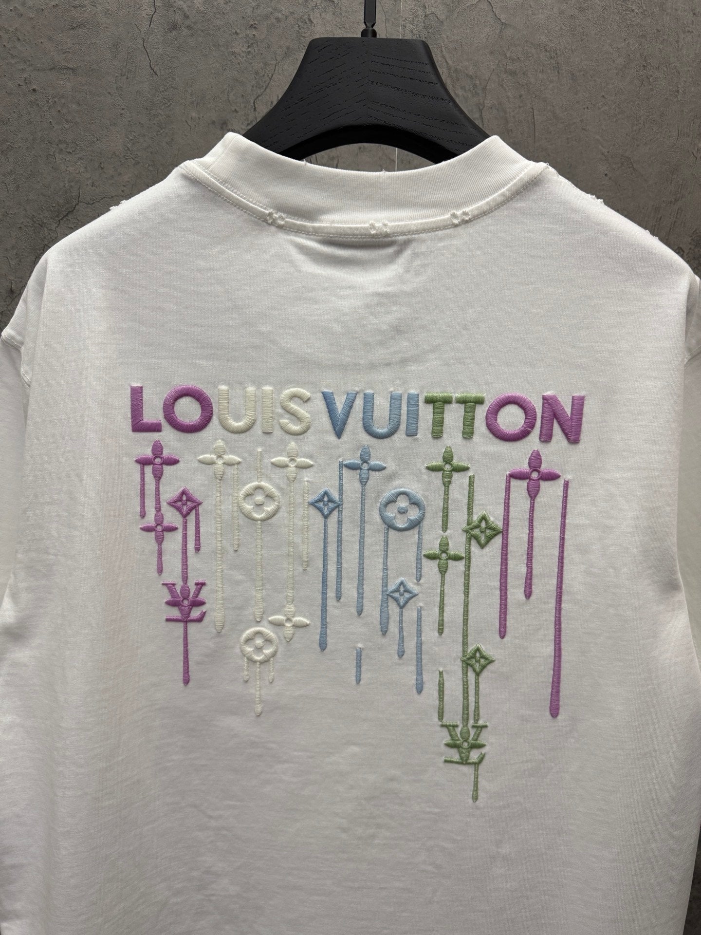 White short-sleeve T-shirt with large Louis Vuitton back graphic