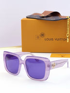 Louis Vuitton sunglasses, purple frame, violet lenses, gold logo metal accents