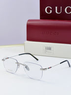 Gucci eyeglasses with clear lenses, metal half-rim frame, black temples and multicolor stripe detail