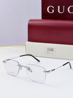 Gucci eyeglasses with clear lenses and metal frame, black temple arms with multicolor stripe accent