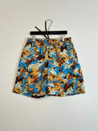 Gucci patterned shorts with elastic waistband, blue and brown all-over print.